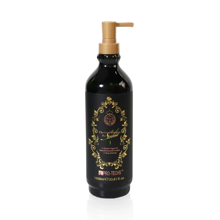 Pump dispenser bottle of shampoo with a black label and gold ornate design, 1000 ml (33.8 fl oz) shown from the top.